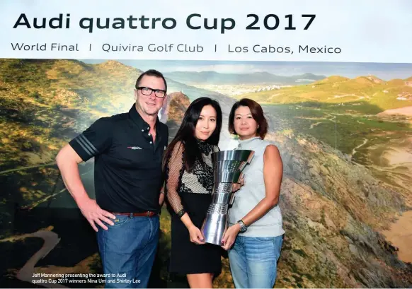  ??  ?? Jeff Mannering presenting the award to Audi quattro Cup 2017 winners Nina Um and Shirley Lee