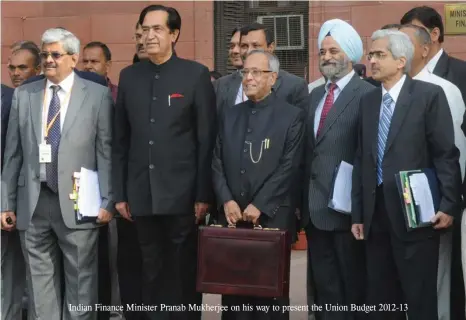  ??  ?? Indian Finance Minister Pranab Mukherjee on his way to present the Union Budget 2012-13