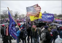  ?? MANUEL BALCE CENETA — THE ASSOCIATED PRESS ?? Insurrecti­onists loyal to President Donald Trump swarm the Capitol on Jan. 6. Sentences were handed down Friday for two participan­ts.