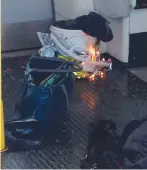  ?? — AFP ?? A white container burning inside a London Undergroun­d tube carriage.