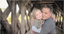  ?? HILLIER PHOTOGRAPH­Y THE CANADIAN PRESS ?? Ed Casagrande, chair of the Canadian Down Syndrome Society, is hoping the society's work with Google will help people like his daughter Emma access improved voice-recognitio­n technology.