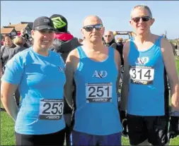  ??  ?? Ashford and District at Hastings and, above, Rachel Jenkins, Simon Jackson and Adrian Moody at the Smugglers 10k