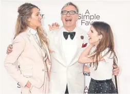  ?? JEFF SPICER GETTY IMAGES ?? Blake Lively, left, director Paul Feig and Anna Kendrick from the film A Simple Favor, which tells the tale of an unlikely friendship between two women.