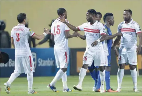  ?? — AFP ?? This file photo taken on August 15, 2016 shows Egypt’s Zamalek players celebratin­g their victory during the African Champions League against Nigeria’s Enyimba FC at Petro Sport Stadium in Cairo.