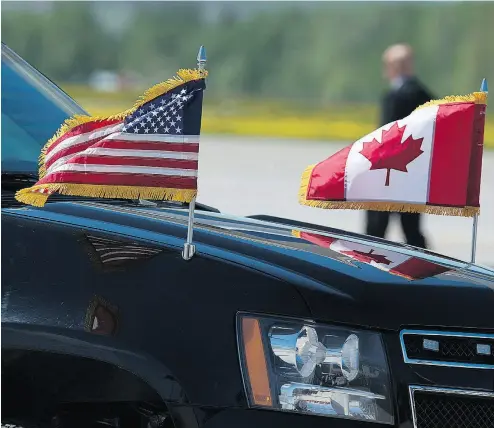  ?? ANDREW VAUGHAN / THE CANADIAN PRESS FILES ?? Canadian and U.S. flags fly as President Donald Trump arrives at the G7 summit in La Malbaie in 2018.