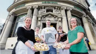  ??  ?? ■ Lloyds Bank celebrates 250 years - manager James Green (centre) and staff Jay Parker, Louise Jagger, Jill Wilson and Elaine Dawson outside Westgate, Huddersfie­ld, branch