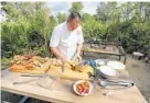  ??  ?? Senior sous-chef Jesse Demmers prepares for a private lunch at the Ritz-Carlton Orlando, Grande Lakes resort on Wednesday.