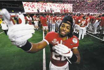  ?? Tom Pennington / Getty Images ?? Alabama running back Najee Harris celebrates after defeating Notre Dame 3114 in their College Football Playoff Semifinal Game at the Rose Bowl in Pasadena on New Year’s Day.