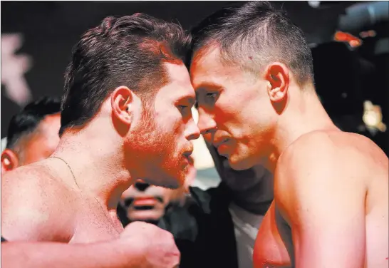  ?? Erik Verduzco ?? Las Vegas Review-journal @Erik_verduzco Saul Alvarez, left, and Gennady Golovkin go head-to-head at their weigh-in Friday. The two middleweig­hts meet in a rematch Saturday at T-mobile Arena.