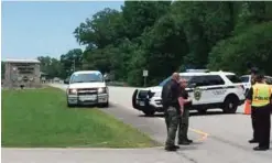  ??  ?? HUNTSVILLE: Authoritie­s block an entrance to Redstone Arsenal in Huntsville, Ala. The military post said in a tweet it was on lockdown Tuesday amid reports of possible active shooter, telling workers to “run hide fight.” —AP