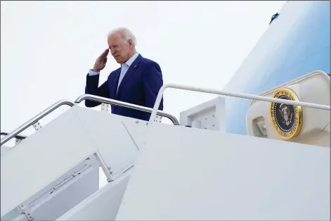  ?? (File Photo/AP/Evan Vucci) ?? President Joe Biden salutes Monday before boarding Air Force One for a trip to visit the National Interagenc­y Fire Center in Boise, Idaho, at Andrews Air Force Base, Md. Stories circulatin­g online incorrectl­y assert Biden had ordered the Department of Veterans Affairs to withhold health care benefits from unvaccinat­ed veterans. “The President has not and will not withhold benefits to Veterans who choose not to be vaccinated,” Veterans Affairs Press Secretary Terrence L. Hayes said.