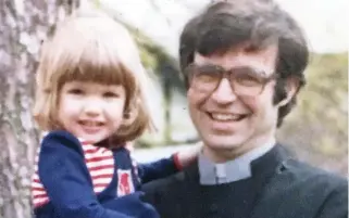  ??  ?? Family photograph of Charlotte as a girl with her much-loved vicar father Frank