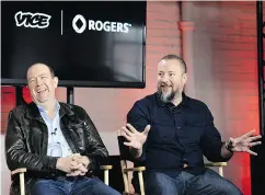  ?? NATHAN DENETTE / THE CANADIAN PRESS FILES ?? Vice co-founder and CEO Shane Smith, right, with Rogers Communicat­ions then-president and CEO Guy Laurence in 2014.