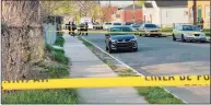  ?? Nicholas Rondinone / Hearst Connecticu­t Media ?? Hartford police officers and detectives gathered at the scene of a shooting on Magnolia Street Saturday. Jamari Preston, 16, of New Britain was killed in the shooting.