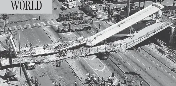  ?? DRONEBASE VIA AP ?? Emergency crews work at the scene of the collapsed 950-ton pedestrian bridge at Florida Internatio­nal University in the Miami area on Thursday.