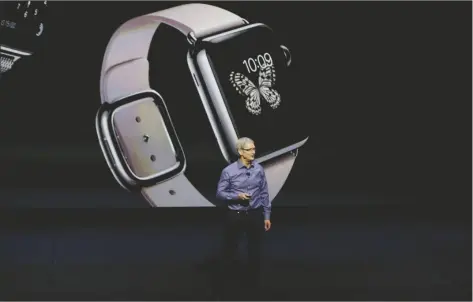  ?? AP PHOTO/ERIC RISBERG ?? Apple CEO Tim Cook discusses the Apple Watch at the Apple event at the Bill Graham Civic Auditorium in San Francisco, in 2015.