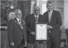  ?? RYAN TAPLIN/SALTWIRE NETWORK ?? Francis Dorrington poses for a photo with Lt.-Gov. Arthur LeBlanc, left, and Premier Stephen McNeil during the Order of Nova Scotia ceremony at Province House on Nov. 26. Dorrington, a former deputy mayor and town councillor in New Glasgow, was also recognized for his role as a community mentor.