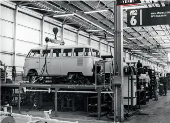  ??  ?? From le  to bo om Assembling the Volkswagen Type 2 Kombi at the Uitenhage SAMAD plant in 1956 – the 1 200 cm3 Kombi cost R1 348; the Ford Ranger’s ancestors, Model A pick-ups, lined up outside the plant in Port Elizabeth; Fiats, Mercedes-benzes and...