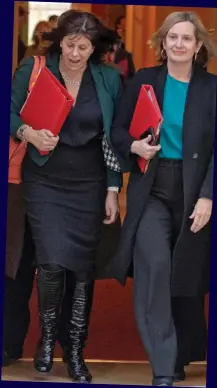  ??  ?? In step: Claire Perry and Amber Rudd pile out