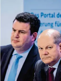  ?? Foto: Christian Spicker, Imago Images ?? Bundesarbe­itsministe­r Hubertus Heil und Finanzmini­ster Olaf Scholz: Die Zusammenar­beit sei sehr mühsam, klagt die Union.