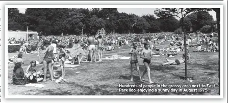  ?? ?? Hundreds of people in the grassy area next to East Park lido, enjoying a sunny day in August 1975