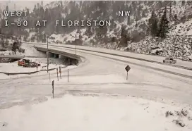  ?? PROVIDED BY CALTRANS VIA AP ?? A snow-covered Interstate 80 is seen in Floriston, Calif., on Friday as the National Weather Service warned of a “cold and dangerous winter storm” that would last through Saturday across the state.
