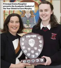  ??  ?? Principal Emma Raughter presents the Academic Student of the Year Shield to Ciara Murphy.