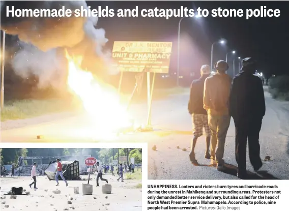  ?? Pictures: Gallo Images ?? UNHAPPINES­S. Looters and rioters burn tyres and barricade roads during the unrest in Mahikeng and surroundin­g areas. Protesters not only demanded better service delivery, but also called for the head of North West Premier Supra Mahumapelo. According to...