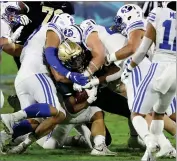  ?? PHOTO BY MIKE STOCKER/SOUTH FLORIDA SUN-SENTINEL ?? Central Florida running back Bentavious Thompson is stopped late in the first quarter against BYU in the Boca Raton Bowl NCAA college football game Tuesday, Dec. 22, 2020, in Boca Raton, Fla.