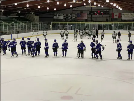  ?? JOE BOYLE — MEDIANEWS GROUP ?? Instead of a handshake, Saratoga and Shen stick tapped each other out of respect to end their game on February 16.