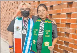  ?? Lorraine Longhi
Las Vegas Review-journal ?? Rancho High School seniors Ashley Garciavall­adares, left, and Marysol Rodriguez stand outside the Clark County School District Edward A.
Greer Education Center, 2832 E. Flamingo Road, on May 19.