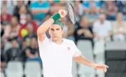  ?? AFP ?? Roger Federer plays an exhibition match in Cape Town in February.