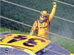  ?? MARK J. REBILAS/USA TODAY SPORTS ?? Glendale NASCAR Cup Series driver Michael McDowell celebrates winning the Daytona 500 early Monday morning.