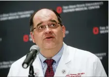  ?? JOHN MINCHILLO — THE ASSOCIATED PRESS FILE ?? Dr. Andrew Thomas, Chief Medical Officer at the Ohio State University Wexner Medical Center, speaks during a news conference in Columbus in 2016. Thomas said Wednesday, July 14, that nine of every 10central Ohioans being hospitaliz­ed for the coronaviru­s are partially vaccinated or unvaccinat­ed.