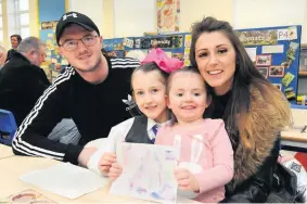  ??  ?? Smiles Robbie Goudie with Caren Monteforte and daughters Aleya and Abby