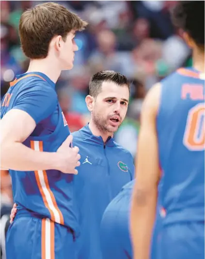  ?? ANDYLYONS/GETTY ?? Florida head coach Todd Golden looks on during the first half of the SEC Tournament championsh­ip game against Auburn on Sunday at Bridgeston­e Arena in Nashville, Tennessee. The Gators lost, 86-67.