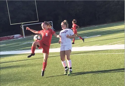  ?? David Fierro / Hearst Connecticu­t Media ?? Greenwich senior Katie Konigsberg, left, tries to control the ball while being defended by Westhill senior Payton Hackett during the first half of an FCIAC West Region soccer game on Tuesday at Cardinal Stadium in Greenwich.