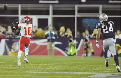  ?? STAFF PHOTO BY CHRISTOPHE­R EVANS ?? NOT HOW THEY DREW IT UP: Cornerback Stephon Gilmore is helpless to stop the Chiefs’ Tyreek Hill from hauling in a 75-yard touchdown pass during the Patriots’ 42-27 loss last night at Gillette Stadium.