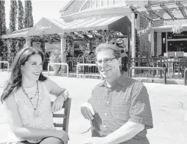  ?? Pin Lim / For the Chronicle ?? Nash D’Amico and daughter Brina sit outside their restaurant in Rice Village. D’Amico said they are excited about the eatery getting a facelift.