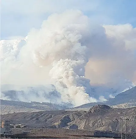  ?? JOHN INNES ?? Wildfires rage in the British Columbia interior as John Innes of Mobile Kitchens Canada delivered a mobile kitchen to the Williams Lake, B.C., airport where firefighte­rs and first responders are stationed.