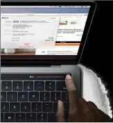  ??  ?? You can unlock the MacBook Pro with the Touch ID fingerprin­t sensor