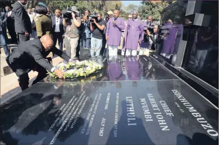  ??  ?? President Jacob Zuma laying a wreath at the grave of Albert Luthuli, Africa’s first Nobel Peace Prize Laureate and one of the country’s respected Struggle stalwarts, in Groutville, KwaZulu-Natal yesterday. Government is hosting the national...