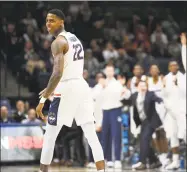  ?? Jessica Hill / Associated Press ?? UConn’s Terry Larrier reacts after scoring on a 3-pointer against Colgate on Friday in Storrs.