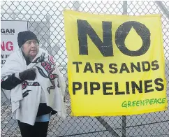  ?? NICK PROCAYLO/PNG FILES ?? Greenpeace protesters blockade the Trans Mountain Pipeline destridge Marine Terminal in Burnaby in 2013. The pipeline’s $9.3-billion expansion project is currently under regulatory reconsider­ation.