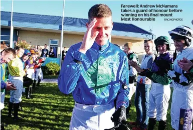  ?? RACINGPHOT­OS ?? Farewell: Andrew McNamara takes a guard of honour before winning on his final mount Most Honourable