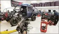  ?? Contribute­d photo ?? The workshop of Legacy Overland, which plans to open a custom off-roader shop in Danbury.