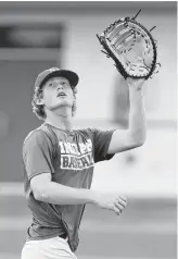  ?? Steve Gonzales / Staff photograph­er ?? Santa Fe pitcher Rome Shubert has relied on baseball to be a distractio­n in the last year since the shooting at the school. “We just try to focus on getting back to normal,” says the junior righthande­r, who is 10-1 this season and has committed to the University of Houston.