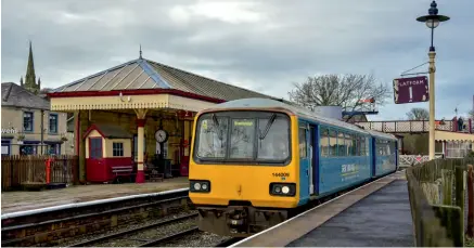  ?? Kevin Delaney ?? The Class 144 Pacer second-generation diesel multiple unit 144009 was in service at the East Lancashire Railway’s recent
Winter Diesel Day. Still carrying its fictitious ‘Great Midlands Trains’ vinyl wrap which was applied to the DMU for a filming contract, the Pacer departs from Ramsbottom station with a service to Bury on February 10. 144009 was also recently used as the backdrop to a music video filmed at the
ELR for Liam Gallagher and John Squire’s new single, Just Another Rainbow.