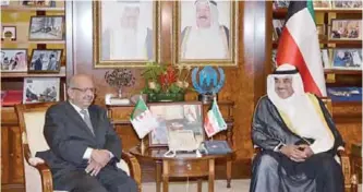  ??  ?? First Deputy Prime Minister and Foreign Minister Sheikh Sabah Al-Khaled Al-Hamad Al-Sabah meets with Algerian Foreign Minister Abdulqader Musahel.