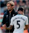  ?? REUTERS ?? Three months after Newcastle’s Georginio Wijnaldum got a pat from rival Liverpool manager Juergen Klopp after a 2-2 draw, the striker has been signed to the Reds.